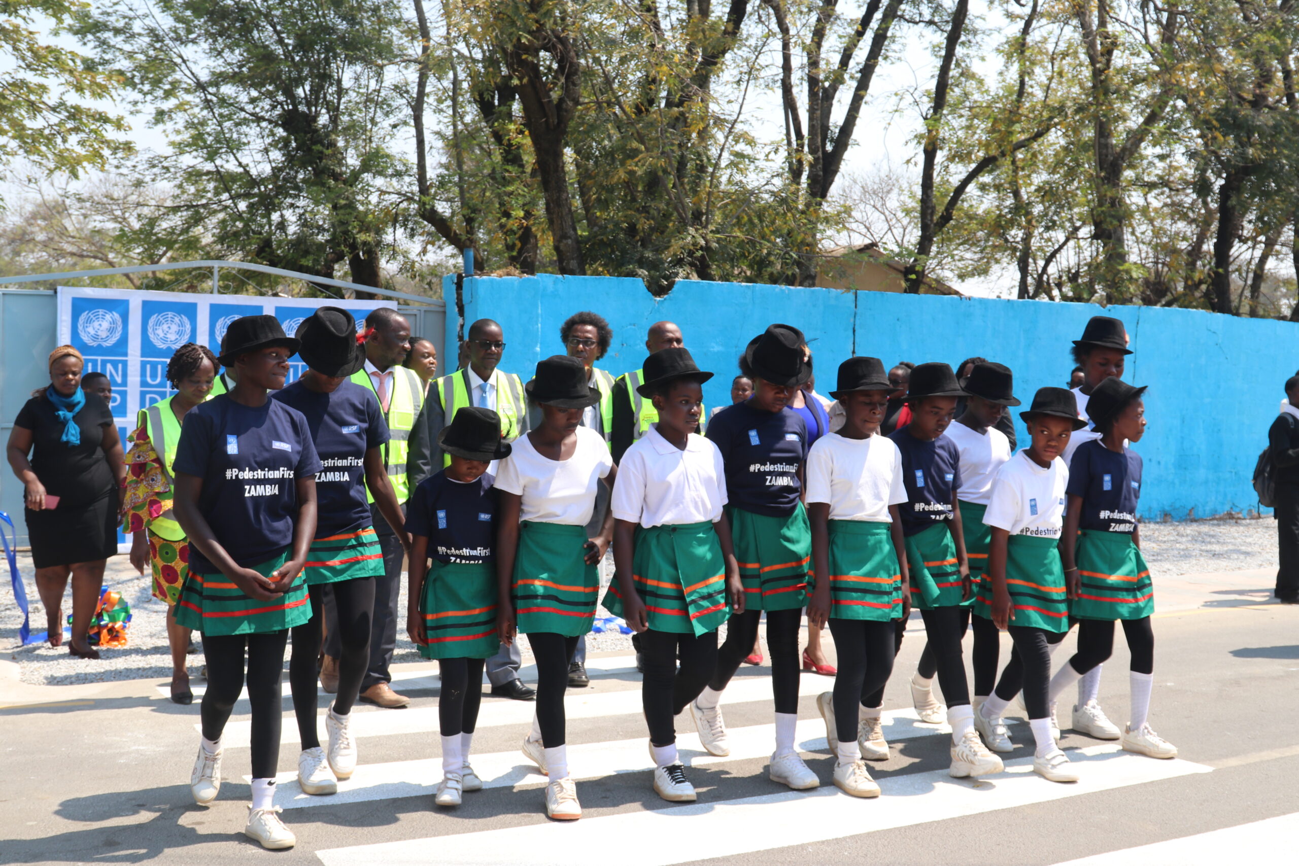 Students of Jacaranda Combined School crossing their newly painted pedestrian crossing