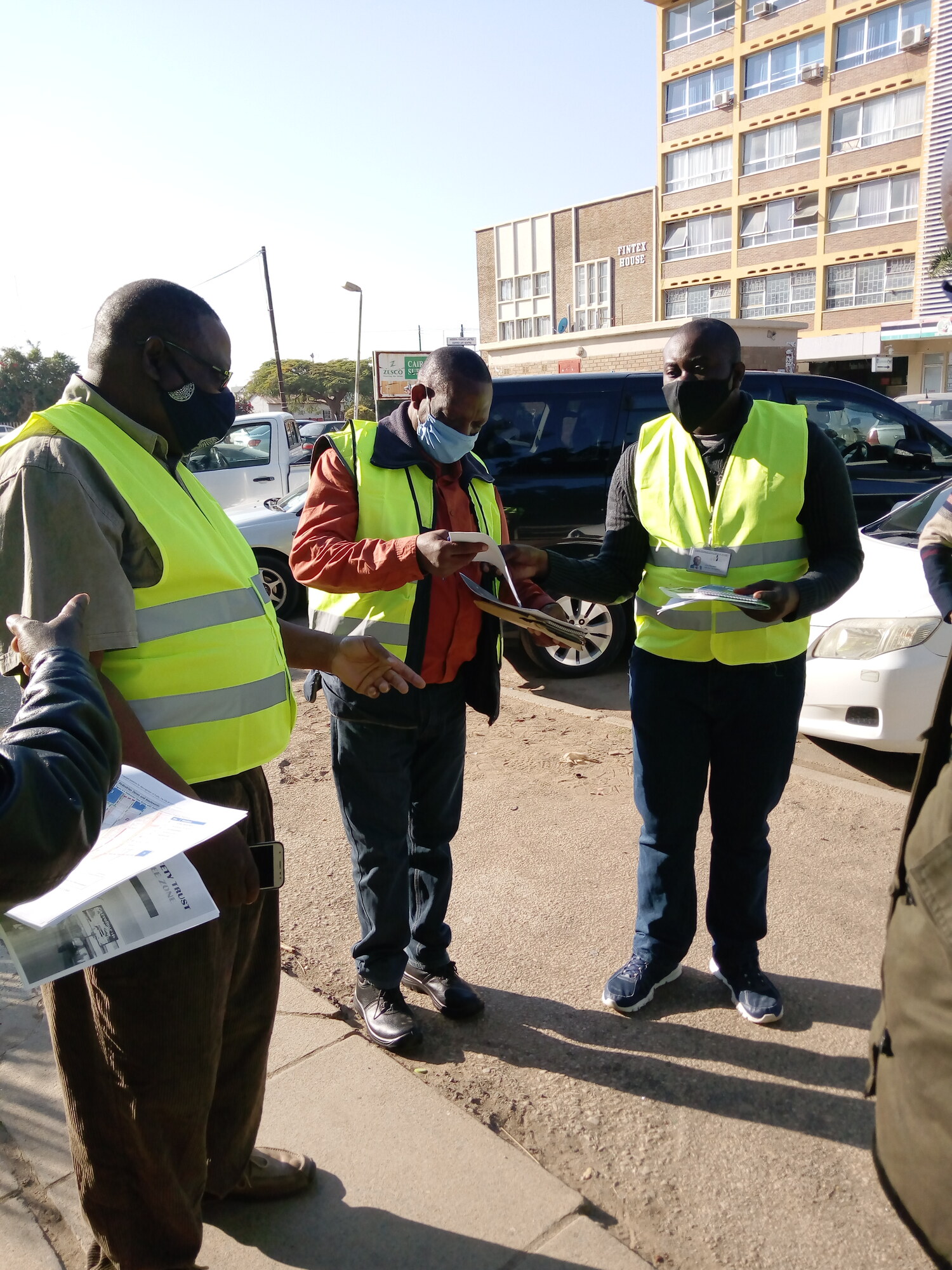 ZRST representatives recording pedestrian conditions during a field inspection in Lusaka