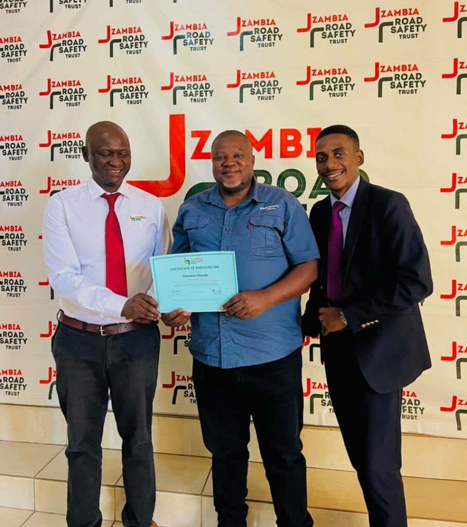 An Africa Worxconnect participant receives his Certificate of Participation alongside ZRST staff after the course, 6 October 2026.