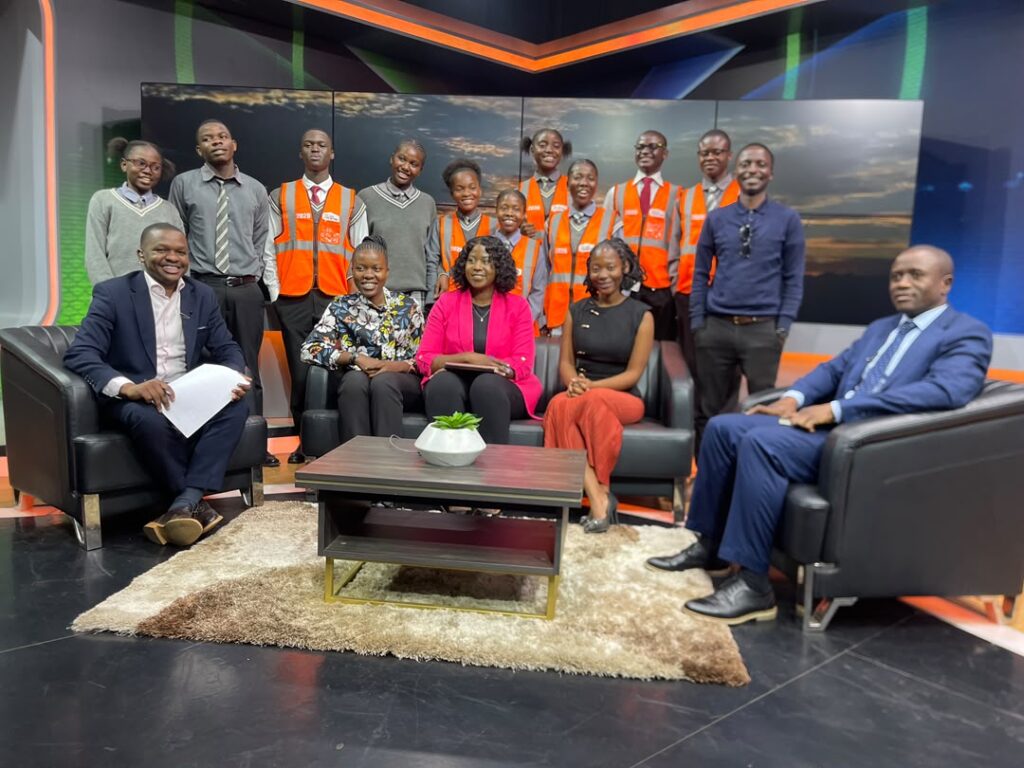 VIA Young Ambassadors from Twin Palm Secondary School with other participants in the ZANIS Morning Blend studio.